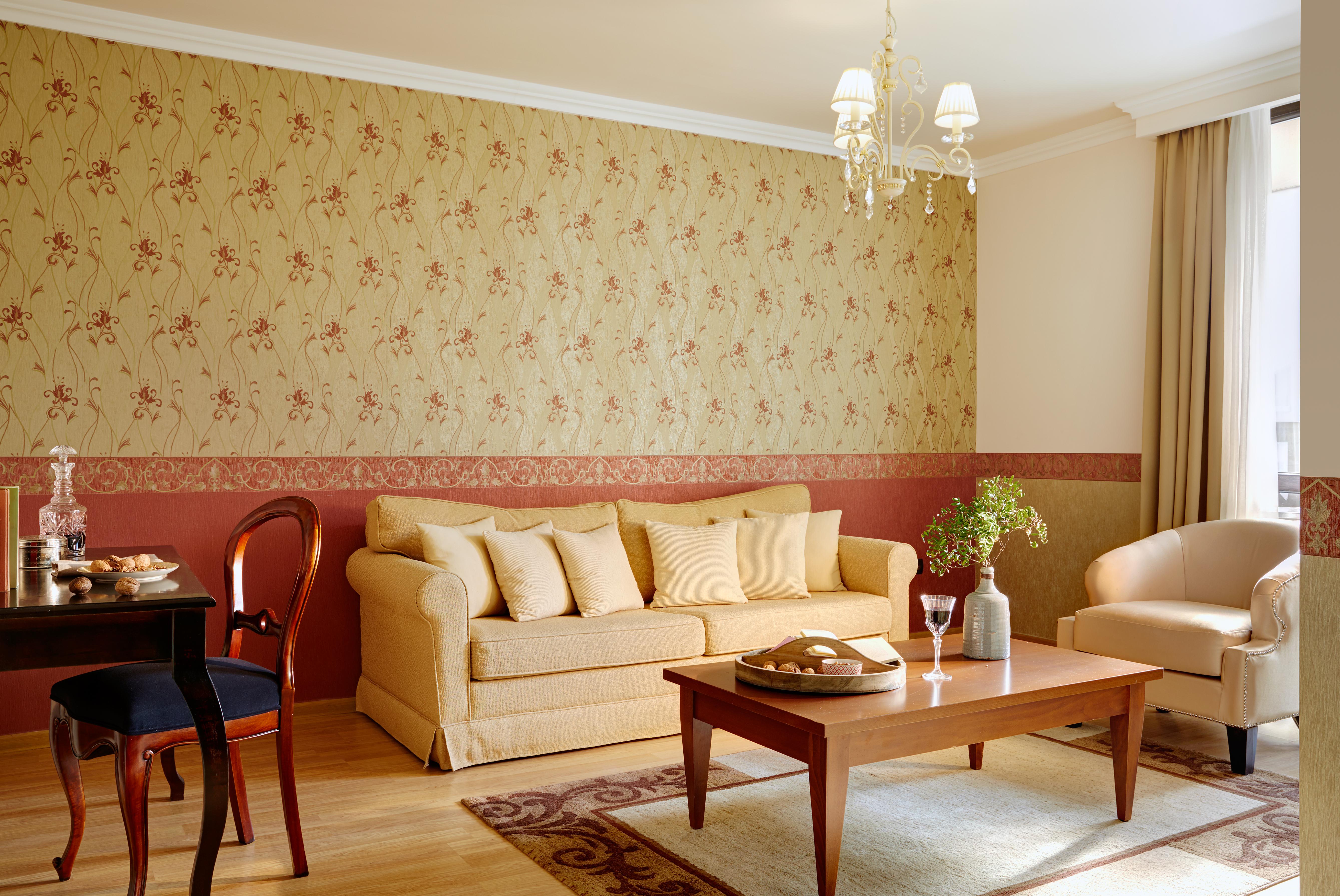 Premier Luxury Mountain Resort Bansko Exteriör bild A living room with wallpaper